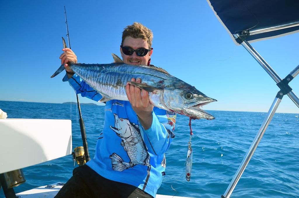 Lee Brake with a nice Spanish mackerel jigged up over the shoals off Mackay on a Halco Twisty knife jig. © Lee Brake